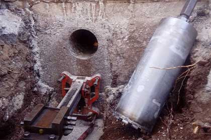 Бурение отверстий в бетоне под трубы